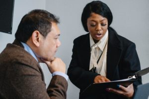 Businessmen discussing a drug test.